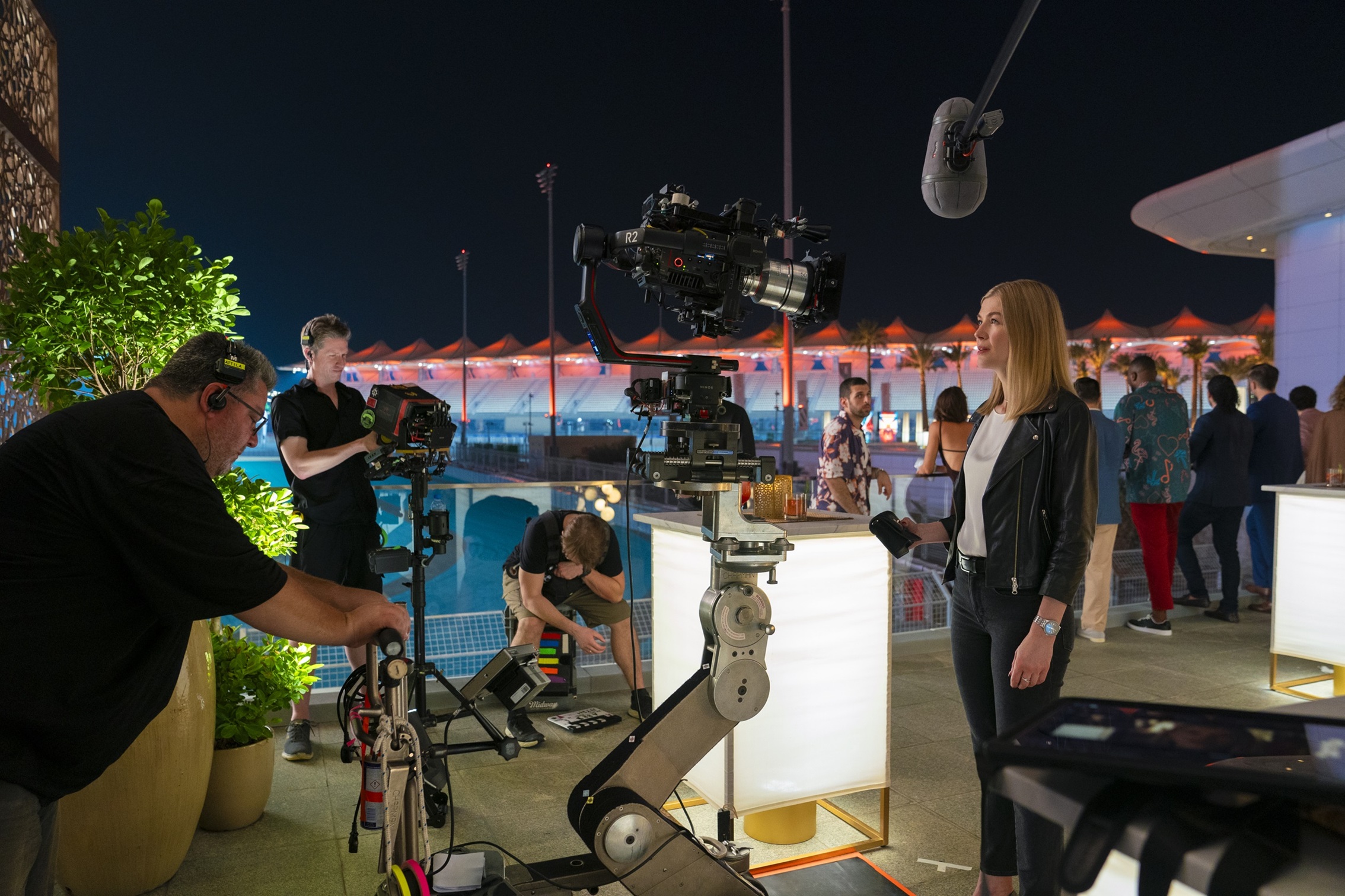 Behind-the-scenes filming of ‘Now You See Me: Now You Don’t’ at W Abu Dhabi – Yas Island, featuring cast and crew during a night shoot.
