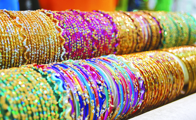 Enjoy the purchase of colorful jewelry from the Afghan market